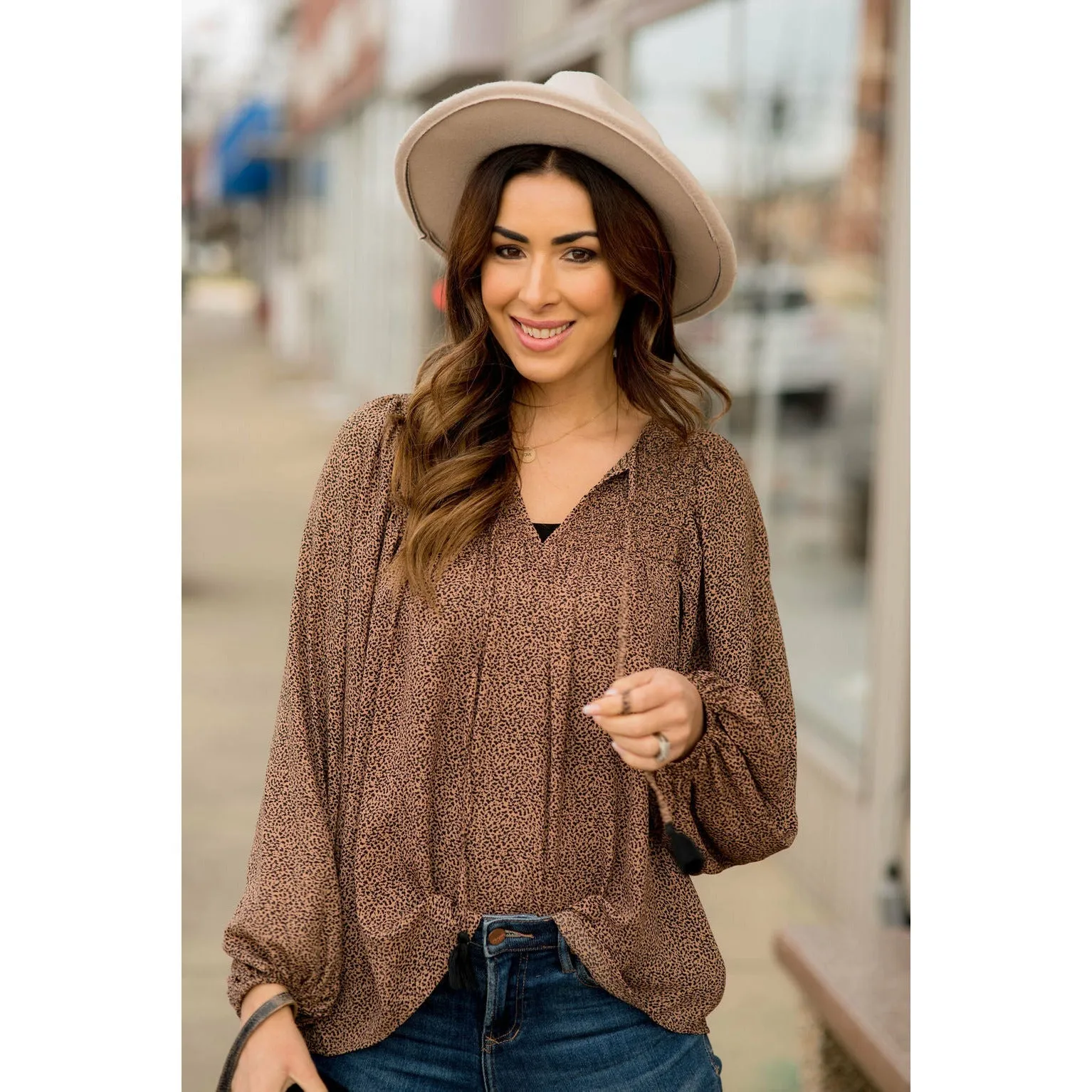 Cheetah V- Neck Tassel Blouse