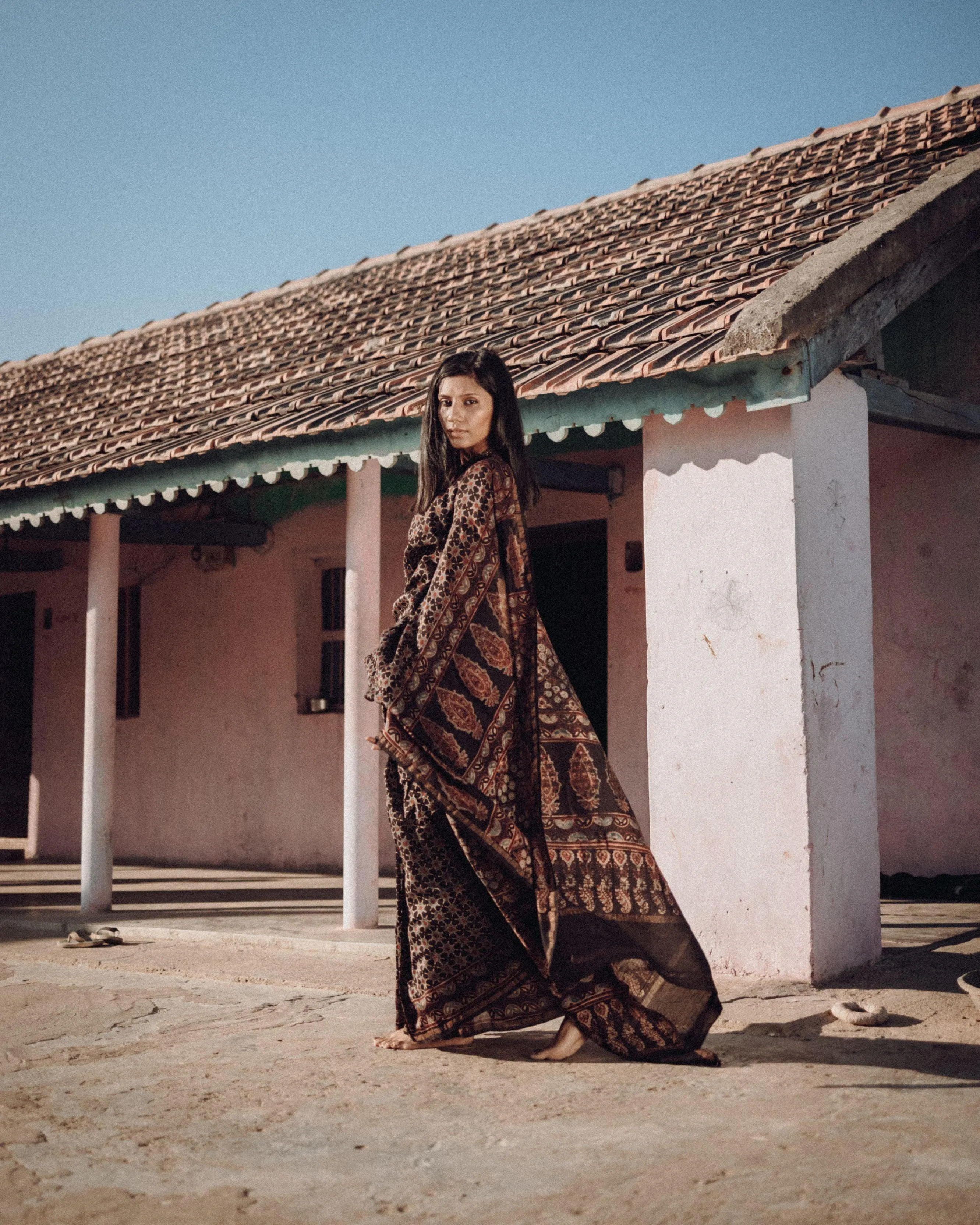 Jharokha -Black silk cotton Ajrakh handblockprinted saree