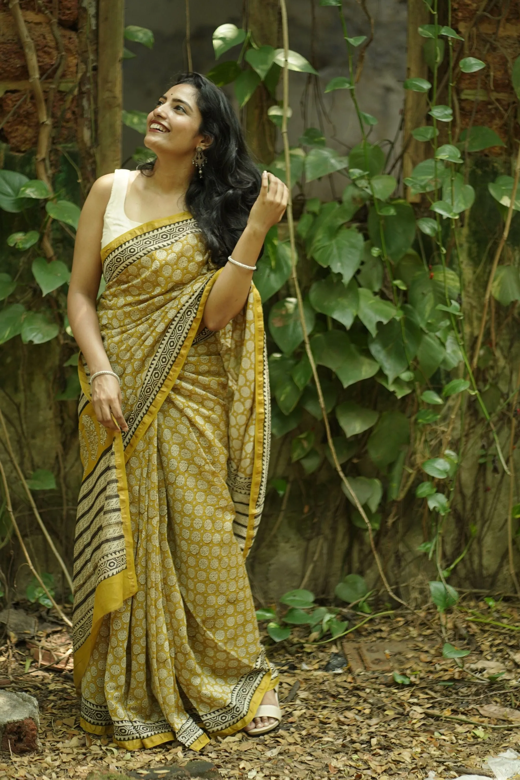 Roheda Bagru Syahi Begar yellow black silk cotton saree